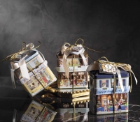 Assorted biscuits in decorative Cosy House metal vintage tin